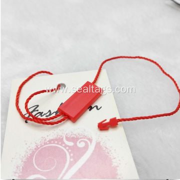 white hang tags with eyelets and ribbon tags